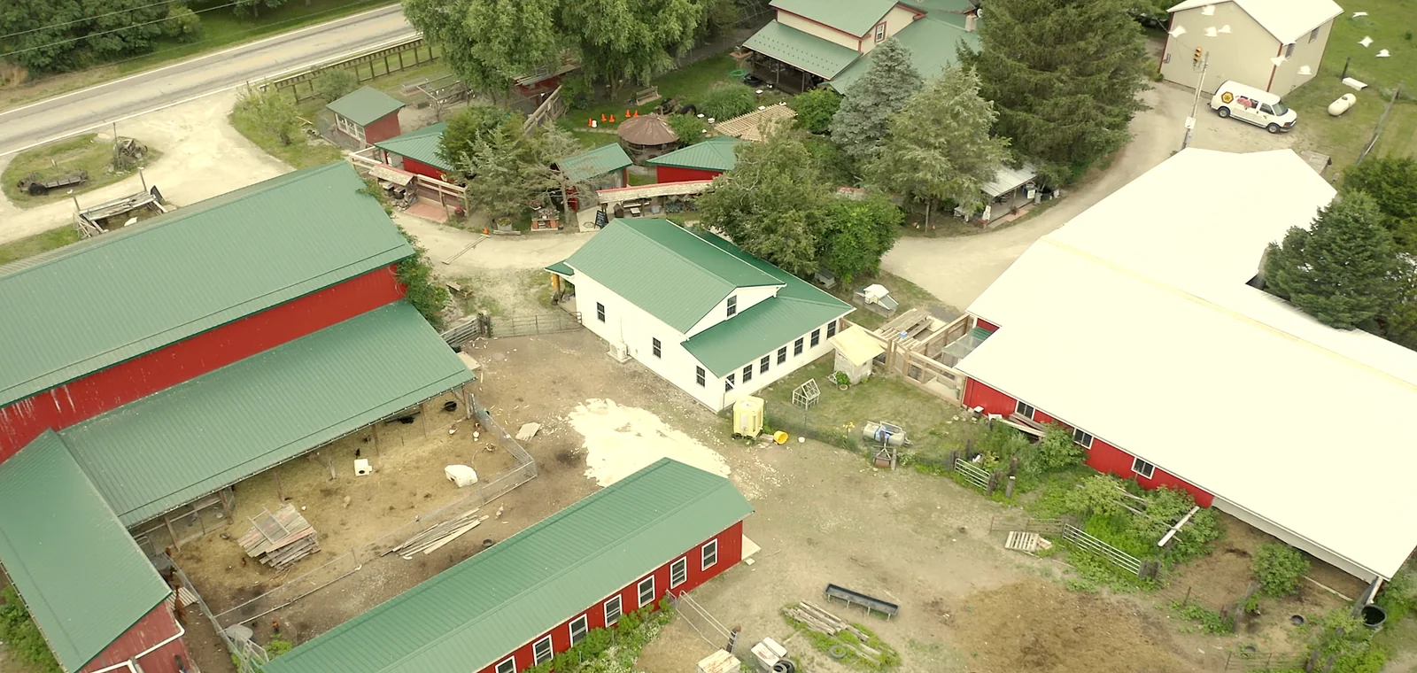 Aerial view of the Queen Right Colonies farm and red barns in Spencer, Ohio